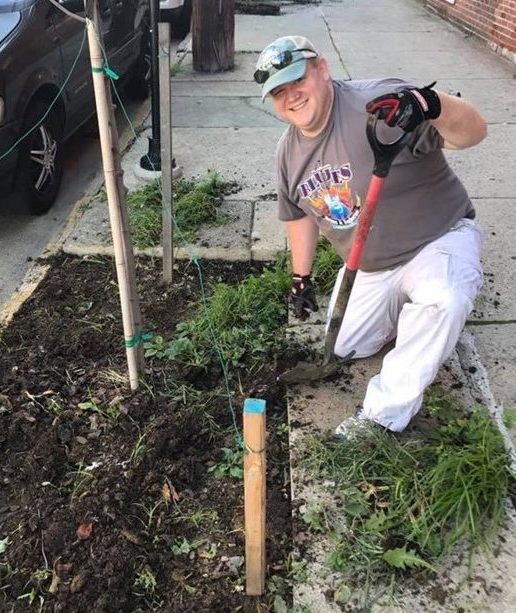 Geoff Brace working to plant trees in Center City Allentown